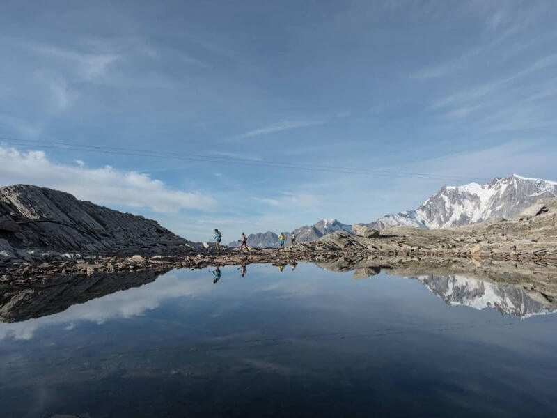 Runners Reflected Near Monte Moro Pass UTMR